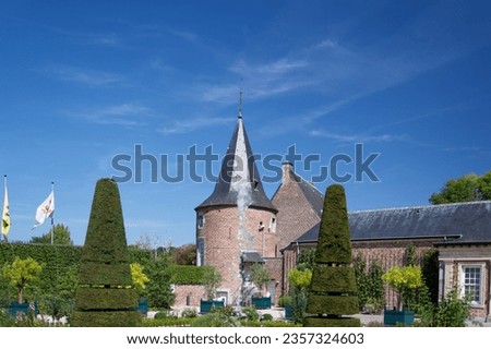 Modern french garden in Alden Biesen Castle in Limburg, belgium. Royalty-Free Stock Photo #2357324603