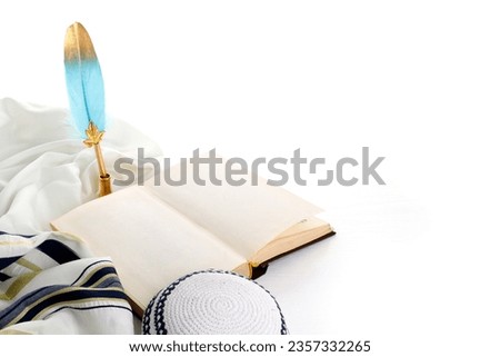 Shofar (horn), book and feather pen. Jewish holiday of Yom Kippur - day of fasting, repentance and remission of sins Royalty-Free Stock Photo #2357332265