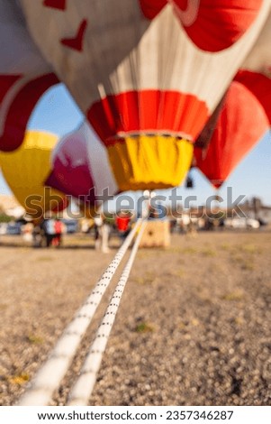 Camera focused on the rope of an air balloon on Cappadocia Balloon area.