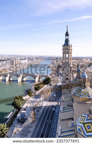 Vertical and panoramic view of Zaragoza Aerial: Basilica del Pilar, La Seo, Roman Bridge Over Ebro - Stunning cityscape photography capturing iconic landmarks in Zaragoza, Spain