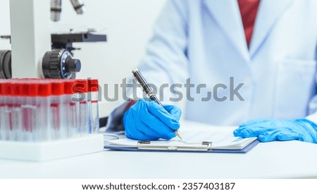 Scientist people working perfumes, fragrances, aromatics Laboratory lab test, fragrance, flavor testing can help you determine ingredients, used to create particular flavor or fragrance. Royalty-Free Stock Photo #2357403187