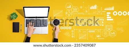 Micropayments theme with person using a laptop computer Royalty-Free Stock Photo #2357409087