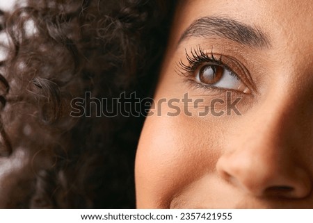 Close Up Studio Portrait Showing Eye Of Smiling Natural Woman Royalty-Free Stock Photo #2357421955