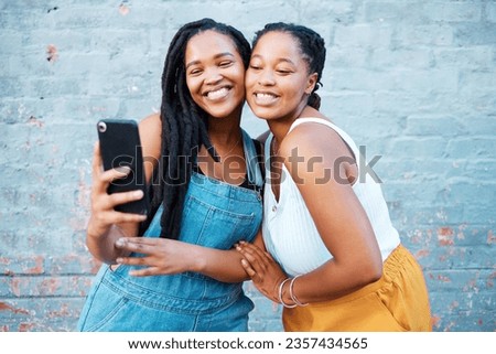 Black women, friends and selfie while smiling and happy outside against city or urban wall and posing for friendship social media picture outside. African females or sisters with 5g network connectio