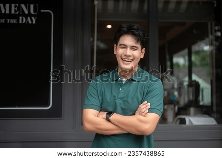 Close up  face of young handsome asian man smiling   Royalty-Free Stock Photo #2357438865