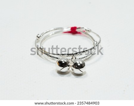 Silver bangle for baby, silver jewelry Royalty-Free Stock Photo #2357484903
