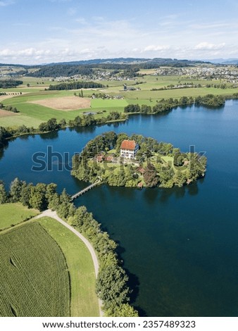 Aerial view of the Mauern Lake with an old, little castle on the small island, Canton Lucerne, Switzerland Royalty-Free Stock Photo #2357489323