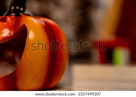 pumpkin with halloween smiley face on dark background