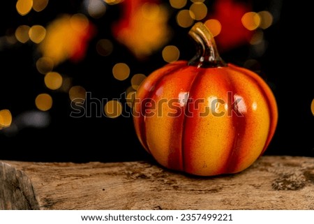 pumpkin with halloween smiley face on dark background
