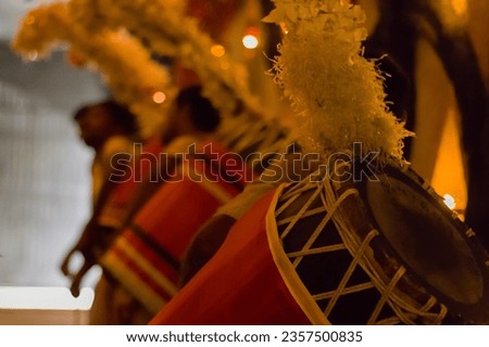 Dhak is a traditional membranophone musical instrument played during durga puja with cane sticks as part of bengali culture. It is local drum also called as dhol. Royalty-Free Stock Photo #2357500835