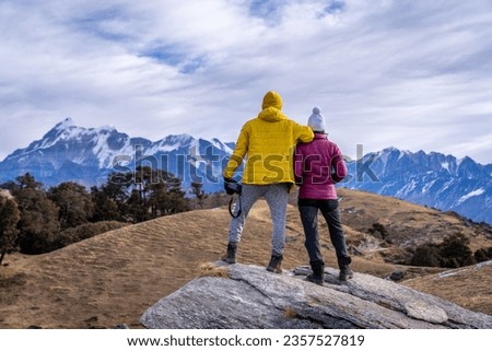 Enjoying the panoramic views of snow capped Himalayan peaks on the Brahmatal trek in Uttarakhand India Royalty-Free Stock Photo #2357527819