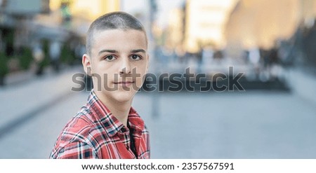 portrait of a young man on a city street