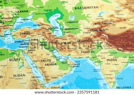 world map or atlas of asia and middle east countries, india, pakistan, afghanistan, iran, iraq , saudi arabia in focus Royalty-Free Stock Photo #2357591181