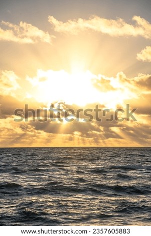 Sunburst sunrise over the ocean