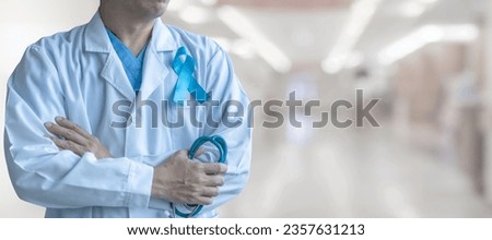 Blue ribbon for prostate cancer awareness, men's health care,  guillain-barre syndrome GBS, Addison's disease concept with symbolic bow on doctor lab coat Royalty-Free Stock Photo #2357631213