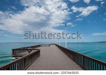 pier in El Coromuel Beach in a sunny summer morning, La Paz Baja California Sur. Mexican SEa Of Cortes. Royalty-Free Stock Photo #2357665033