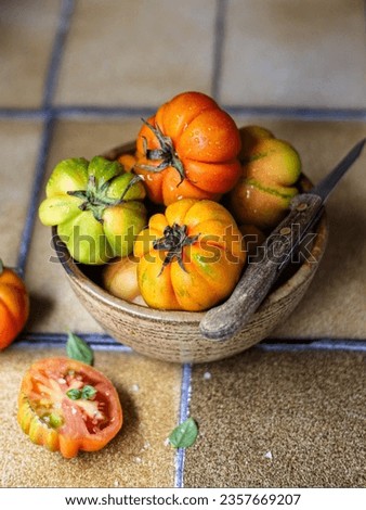 Beautiful decorated tomatoes images photos pictures.Tomato vegetables pictures images.Tomato salad images.