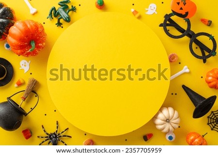 Delightful Halloween candy collection by kids. Top view picture showcasing sweets and Halloween decorations on a yellow isolated background, versatile for text or advertising use