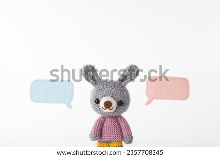 Handmade knitted toy. cute and small animal Amigurumi .speech bubble