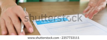 Close-up of woman agent of insurance company offering to sign car insurance contract. Auto insurance form concept