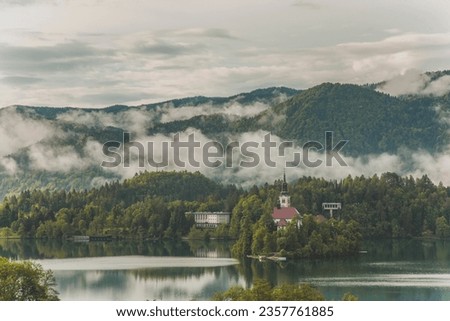 Lake Bled Reflections and Sunset Time in the Julian Alps, Autumn Season European Alps, Bled Radovljica, Slovenia Royalty-Free Stock Photo #2357761885