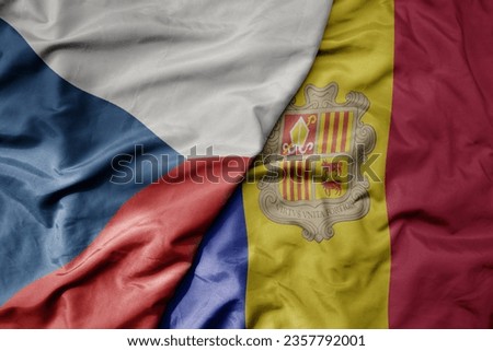 big waving national colorful flag of czech republic and national flag of andorra . macro