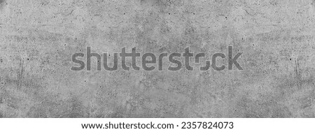 gray textured background of a cement coating Royalty-Free Stock Photo #2357824073