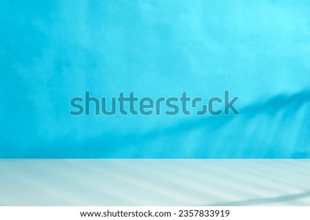 Abstract pastel blue studio background for product presentation, Blurred backdrop with copy space.