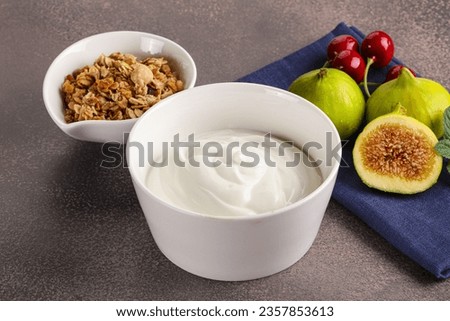 Healthly breakfast - Traditional homemade Greek yoghurt with granola
