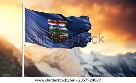 Flag of Alberta on a flagpole against a colorful sky Royalty-Free Stock Photo #2357924027