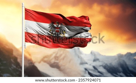 Flag of Austria on a flagpole against a colorful sky Royalty-Free Stock Photo #2357924071