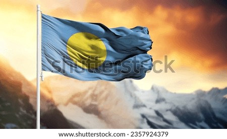 Flag of Palau on a flagpole against a colorful sky