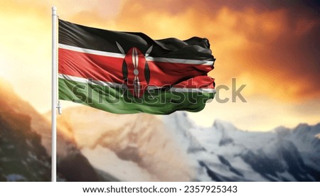 Flag of Kenya on a flagpole against a colorful sky