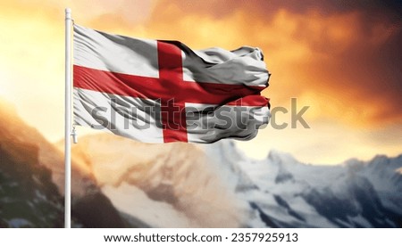 Flag of England on a flagpole against a colorful sky