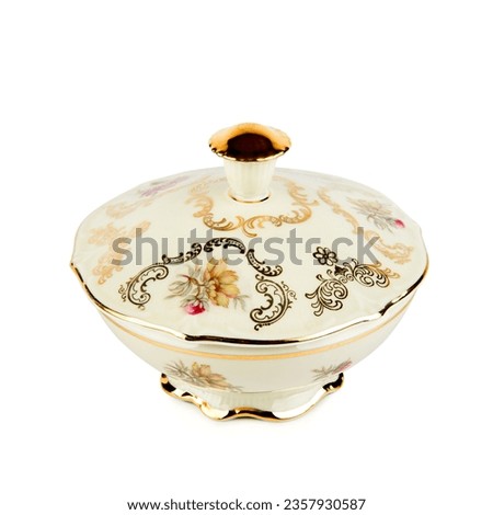 Porcelain box for sweets or jewelry isolated on a white background. German vintage porcelain. Royalty-Free Stock Photo #2357930587
