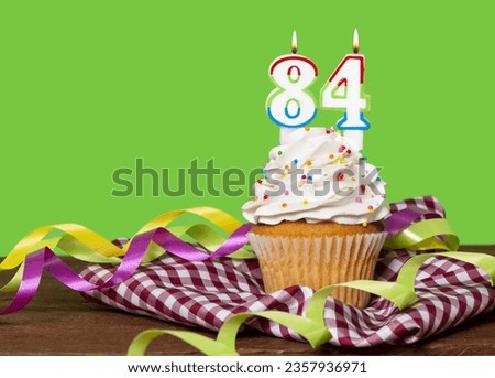 Cupcake With Number For Birthday Or Anniversary Celebration; Number 84.