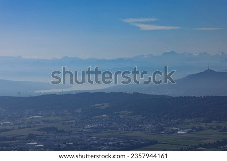 swiss panoramic photography with lake of Zurich, Zurich city, Uetliberg hill and the alps in the background