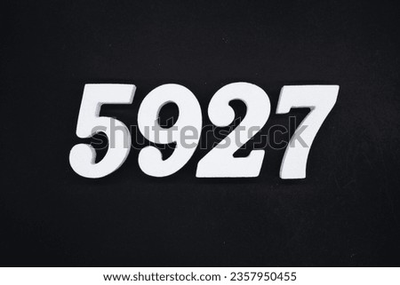 Black for the background. The number 5927 is made of white painted wood.