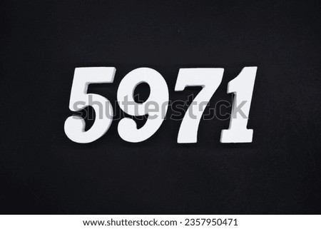 Black for the background. The number 5971 is made of white painted wood.