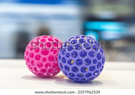 hollow sphere produced by 3d printing demonstrating layers and technical support