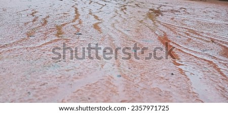 Patterns on the ground after rain. Royalty-Free Stock Photo #2357971725