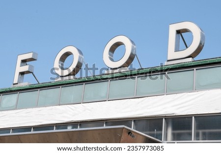 food sign on top of building