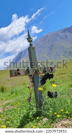 ancient cross on top of a mountain