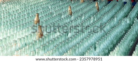 rows of glass bottles for tossing game Royalty-Free Stock Photo #2357978951