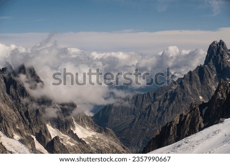 the mountain range of mont blanc covered with snow at punta hellbronner in courmayeur in the aosta valley in july 2023