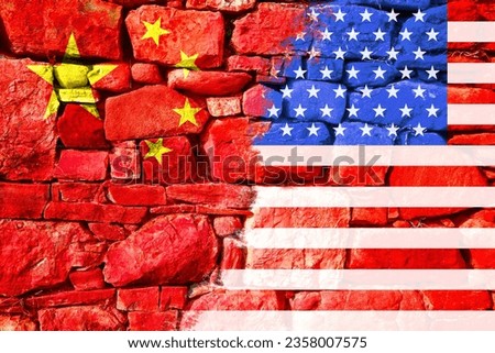 Flags United States and China painted on a stone wall. Concept of sanctions, trade war, the deterioration of diplomatic relations, confrontation and severance of agreements