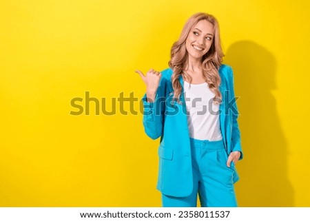 Photo of stunning positive person toothy smile look direct finger empty space isolated on yellow color background