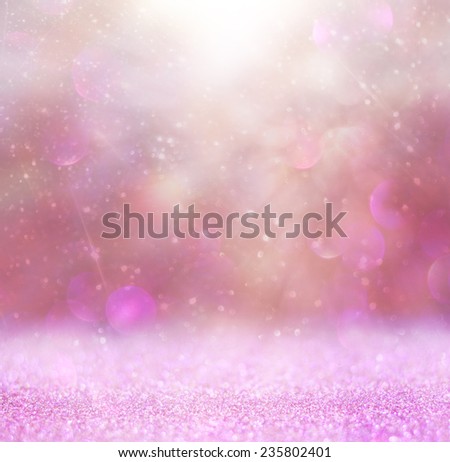 blurred abstract pink and purple  bokeh lights and textures. image is defocused