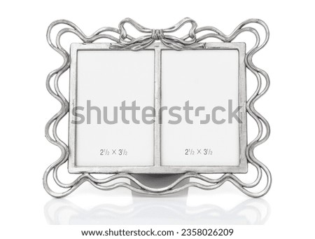 Ornate metal picture frame for small portraits