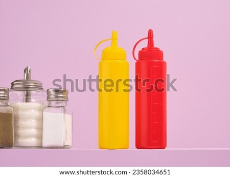 Preparing delicious food with sauces and spices. Dinner in modern restaurant. Royalty-Free Stock Photo #2358034651